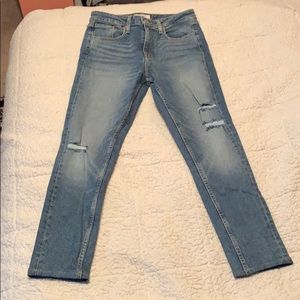 Light blue slightly distressed denim jeans